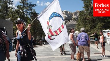 QAnon Believers Gather In Dallas Awaiting Return Of Long-Dead JFK Jr.